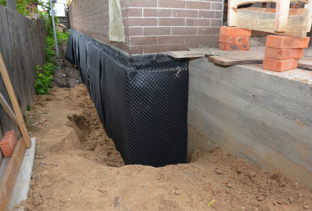 SJ Waterproofing Pros technician performing targeted Basement Waterproofing assessment in Jamestown, TN